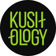A circular logo on a black background featuring the word "KUSHOLOGY" in stylized, lime-green typography.